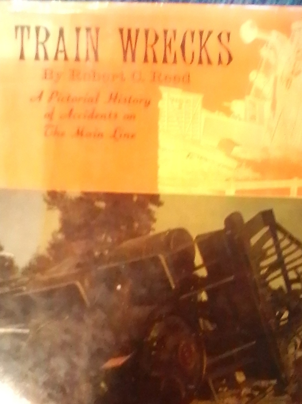 Train Wrecks Decorative Coffee Table Book - Orange